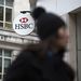 The HSBC logo hangs outside a bank branch in London. Research appears to indicate that the bank will recover eventually after the money-laundering scandal at a subsidiary in Switzerland. Picture: BLOOMBERG/SIMON DAWSON